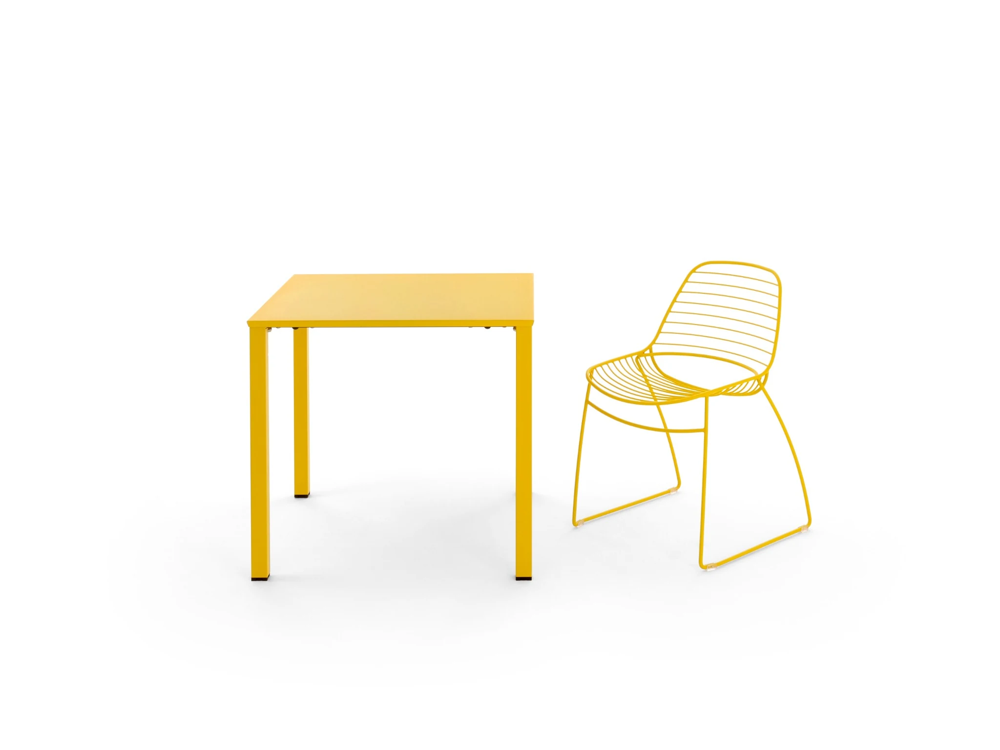 Golden yellow Moontable paired with wire seating
