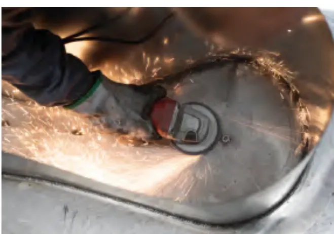 Grinding a weld back flush